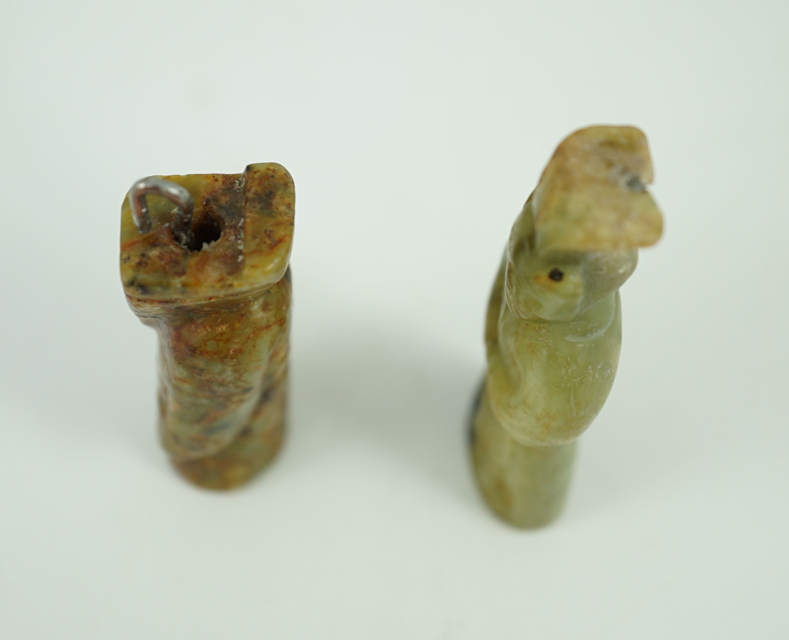 Two Chinese archaic jade figures of a man, probably Western Zhou to Han dynasty